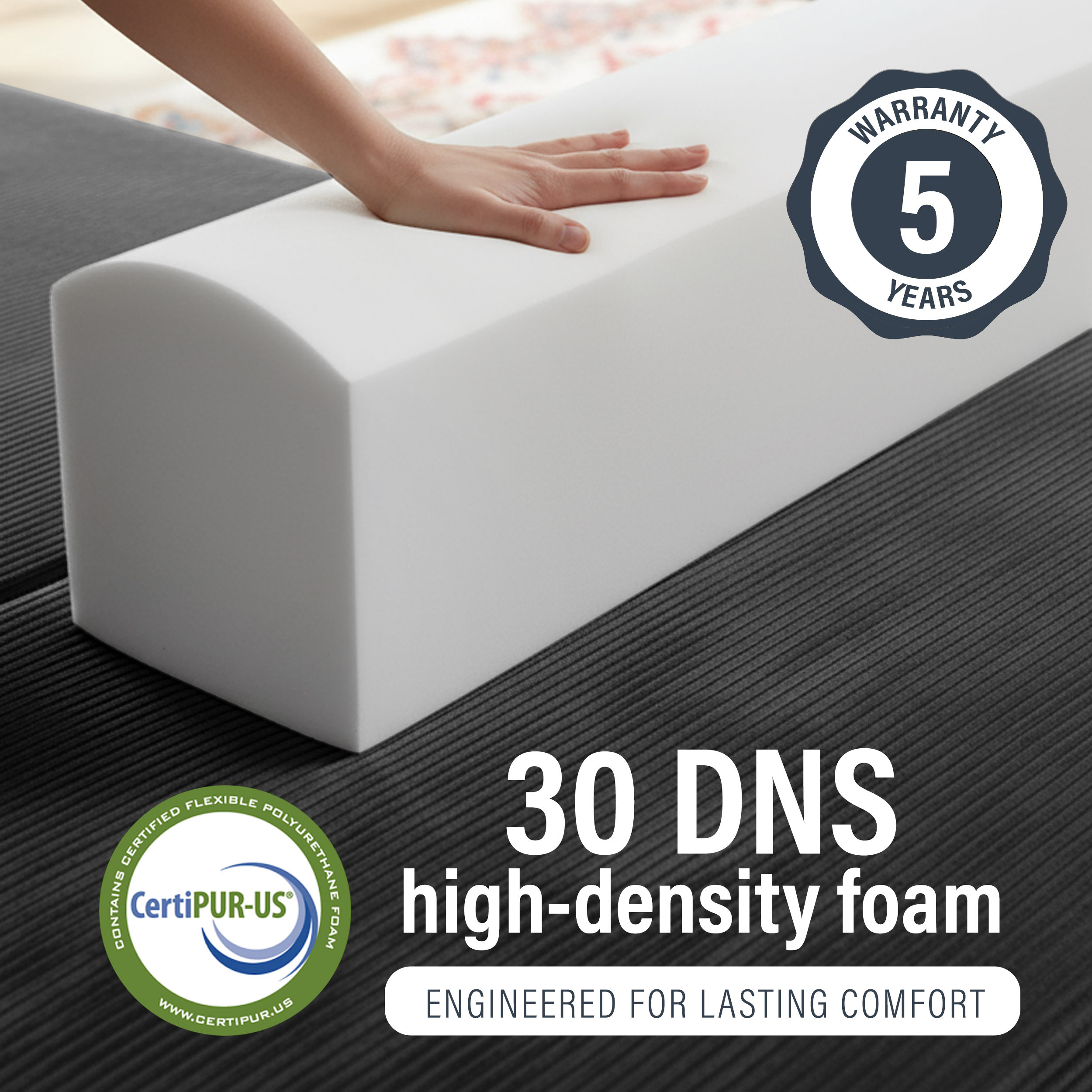 Image of hand pressing into 30 DNS high-density foam with 5 year warranty.