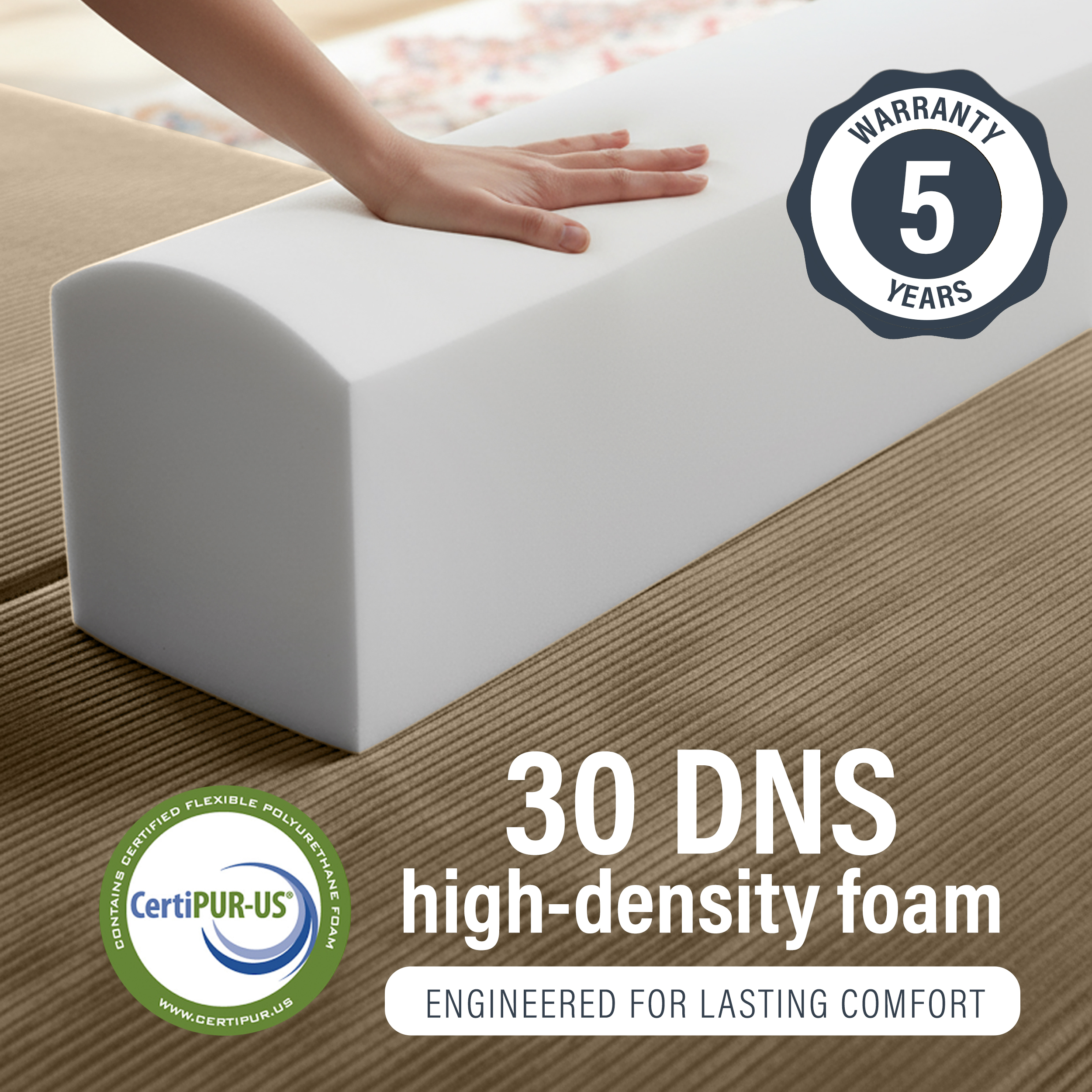 Image of hand pressing into 30 DNS high-density foam with 5 year warranty.