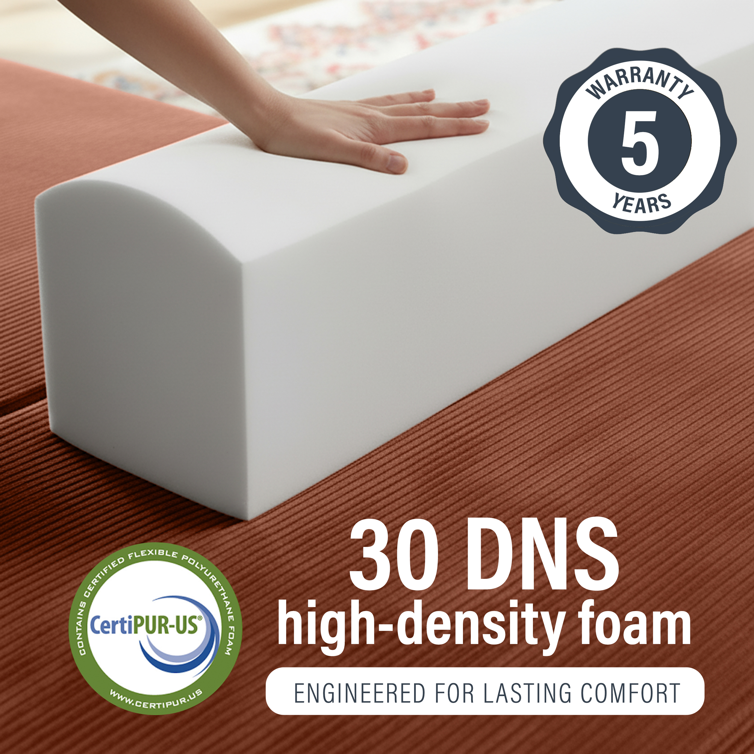 Image of hand pressing into 30 DNS high-density foam with 5 year warranty.