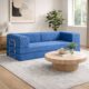 Image of blue modular couch in living room.