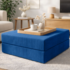 Blue ottoman in living room.