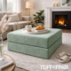 Green ottoman in living room.