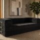 Black boneless, modular couch in living room.