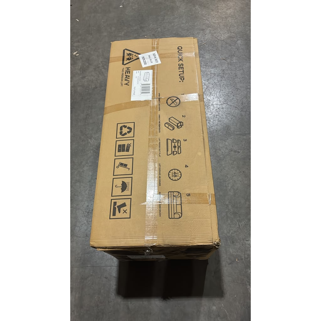 Photo showing box that couch travels in.