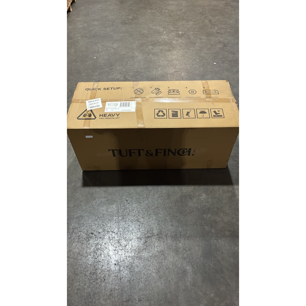 Photo showing box that couch travels in.