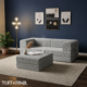 Gray boneless modular couch sitting in living room.